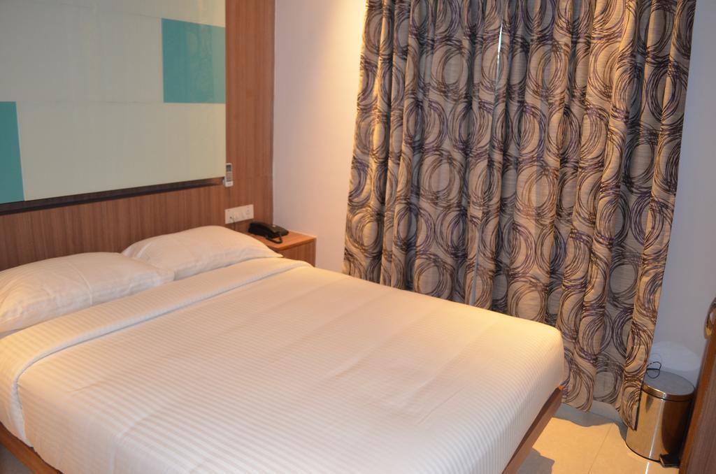 Itsy Hotels Hiland Suites Bangalore Bilik gambar